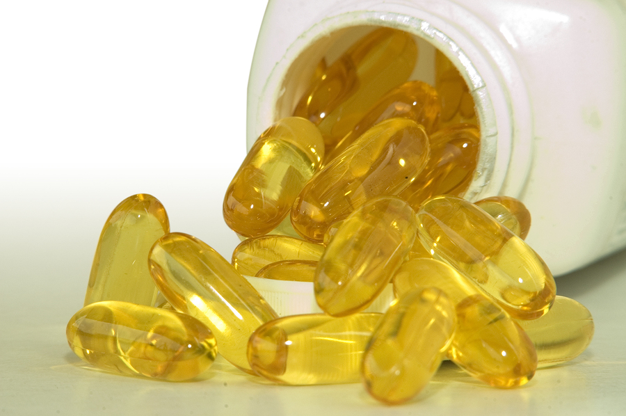a bottle of omega 3 fish oil capsules